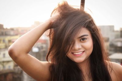 Portrait of smiling young woman