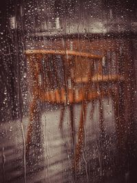 Full frame shot of wet glass window during rainy season