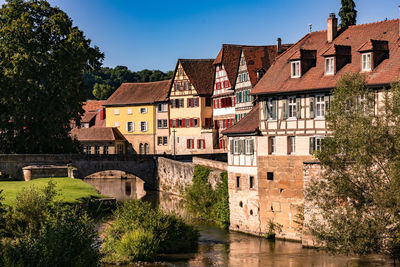 Historic half-timbered houses on steinernen steg in the old town of schwaebisch hall in wuerttemberg