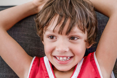 Close-up portrait of smiling boy