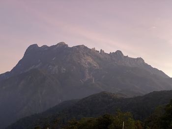 Scenic view of mountains against sky during sunset