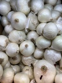 Full frame shot of onions for sale at market