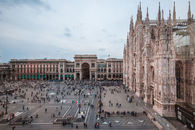 High angle view of people at piazza del duomo against sky