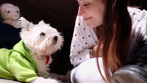 Portrait of woman with dog