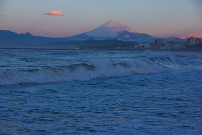 Scenic view of sea against sky during sunset