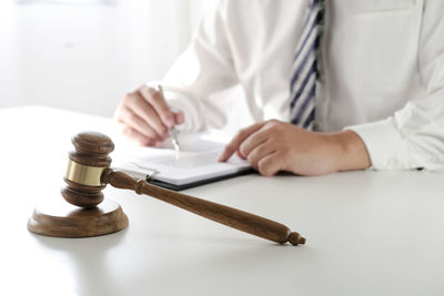 Close-up of person working on table