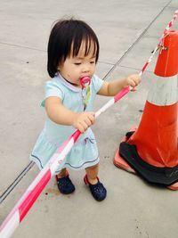 High angle view of cute girl playing