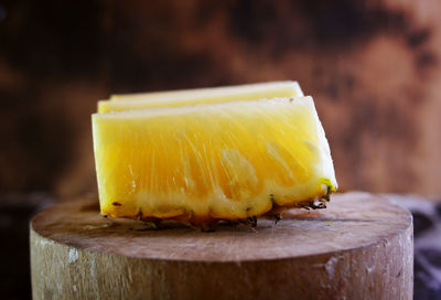 Close-up of yellow bread on cutting board