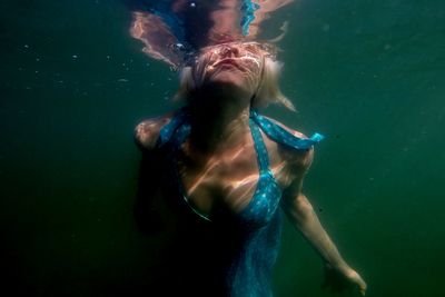 Close-up of woman swimming in sea