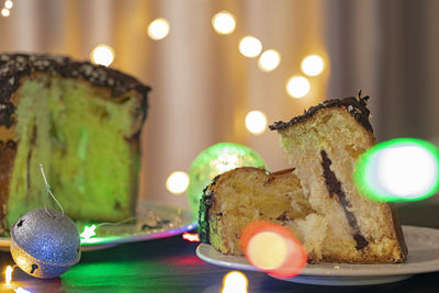 Close-up of illuminated christmas lights on table