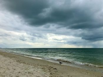 Scenic view of beach against sky