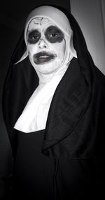 Portrait of boy wearing nun costume during halloween