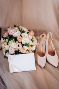 Close-up of white roses on table