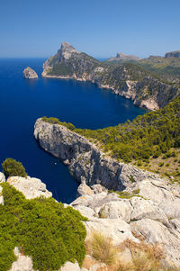 Scenic view of sea against clear blue sky