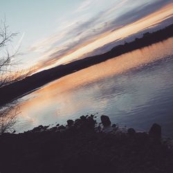 Scenic view of sea at sunset