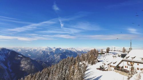 Scenic view of snowcapped mountains against sky