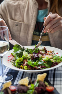 Close-up of woman eating food