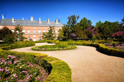 View of garden with buildings in background