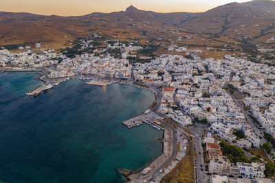 High angle view of townscape by sea