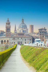 The famous cityscape of mantua from the bridge over the mincio at sunset