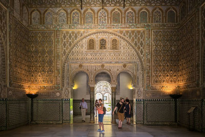 Group of people in front of historical building