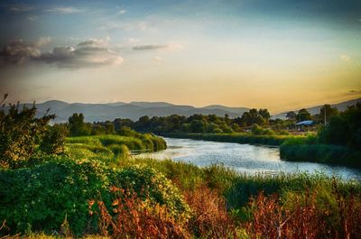 Scenic view of landscape against sky during sunset
