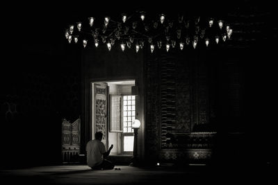 Woman sitting at home