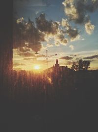 Sun shining through clouds