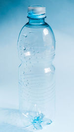 Close-up of water bottle on table