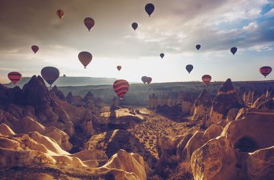 View of hot air balloons in sky