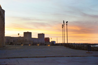 City against sky during sunset