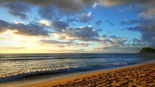 Scenic view of sea at sunset