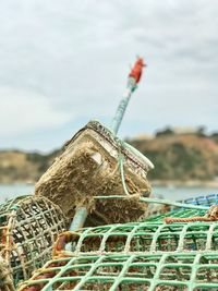 Close-up of fishing net on beach