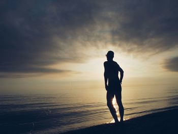 Silhouette of people on beach