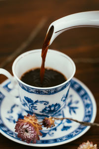 Close-up of tea cup on table