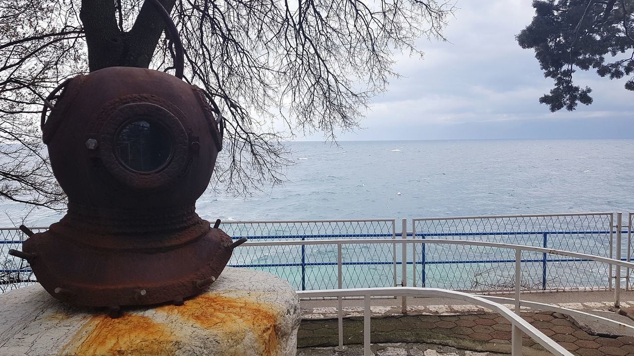 SEA SEEN THROUGH RAILING