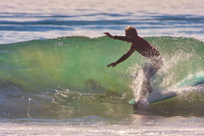 Side view of a splashing water