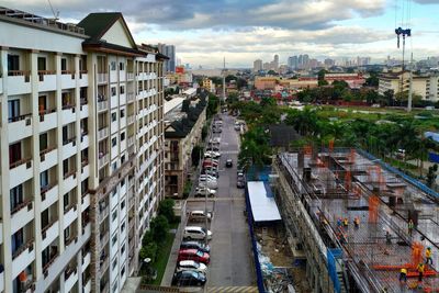 High angle view of street amidst buildings in city
