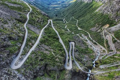 High angle view of winding road by river