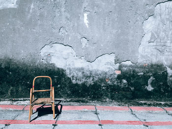 View of empty chairs against wall