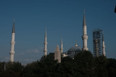 View of buildings against clear sky