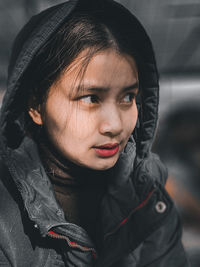 Close-up portrait of woman with black hair