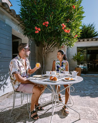 Couple sitting at restaurant