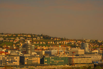 High angle view of buildings against sky at sunset