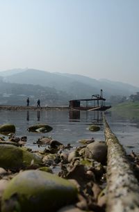 Scenic view of river and mountains