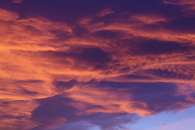 Low angle view of clouds in sky during sunset