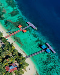 High angle view of parasol in sea