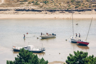 High angle view of boats moored in sea