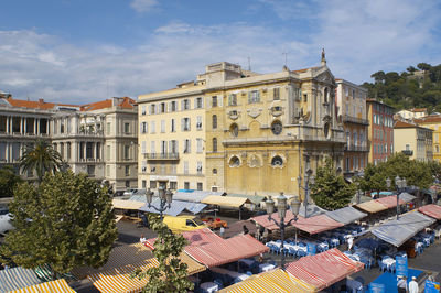 High angle view of buildings and market in city of nice, france