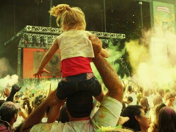 People enjoying at concert